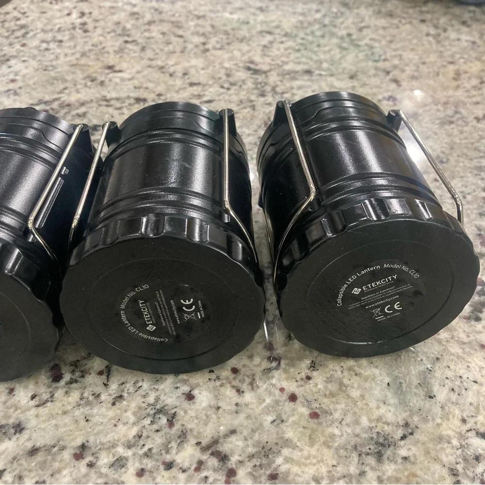 Set of 4 Etekcity black LED travel/camping lanterns Preowned **No Batteries**